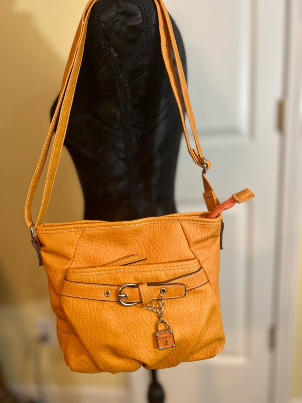 Rosetti Orange Crossbody Bag with Lock Charm Accent